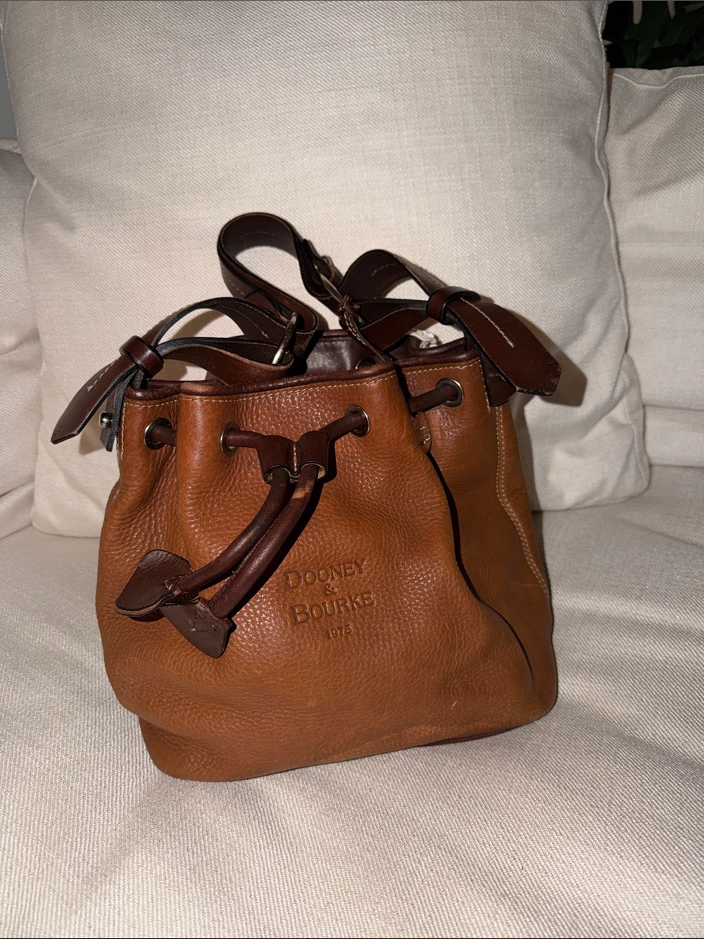 Dooney & Bourke Tan and Dark Brown Leather Drawstring Bucket Bag